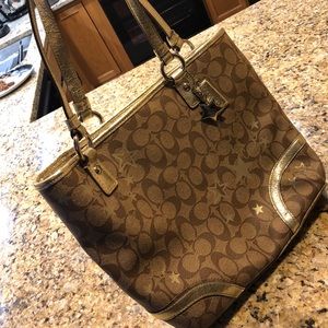 Gold star coach purse